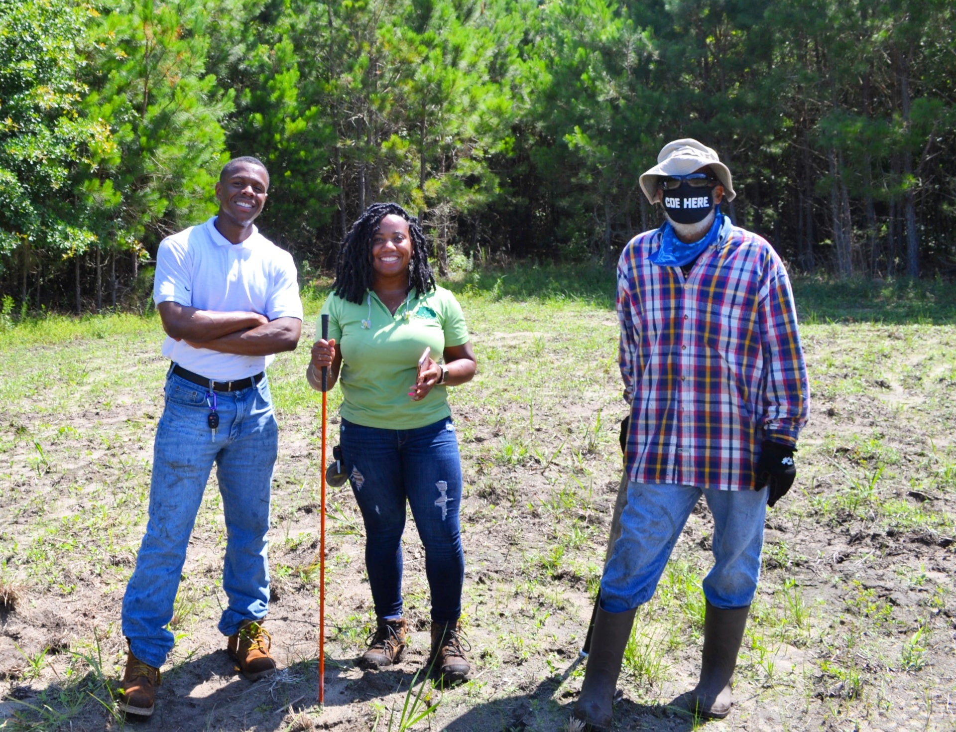 farmers smiling in field