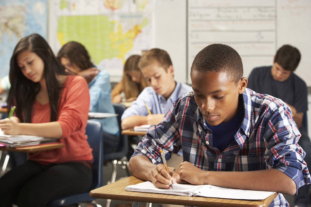 Student taking notes