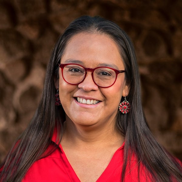 Jessica Stago, a woman of color, headshot